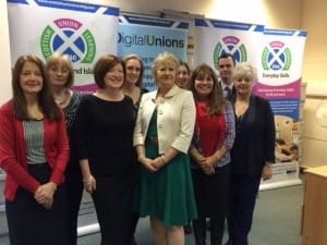 Picture of Roseanna Cunningham standing with the Scottish Union Learning team.